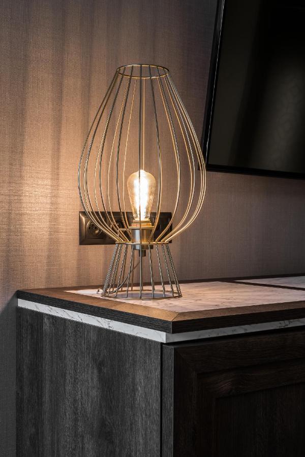 Nosalowy Park Hotel & Spa Zakopane Bagian luar foto A table lamp